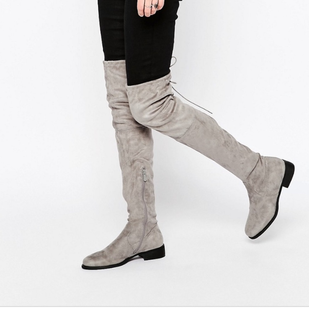 Public desire over the knee boots